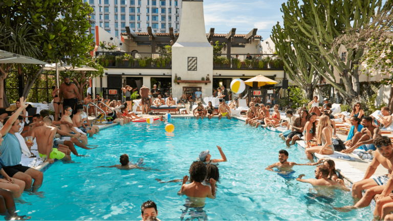 Guests mingling at a pool party