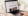 Alt des: Woman looks at Instagram on laptop / Source: