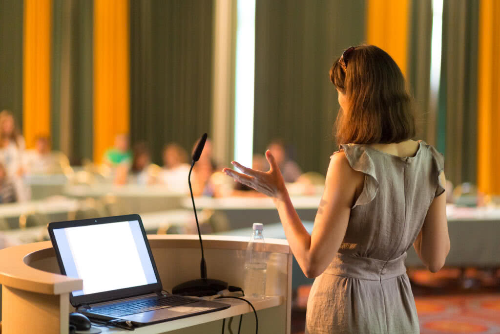 Speaker at Business Conference and Presentation.