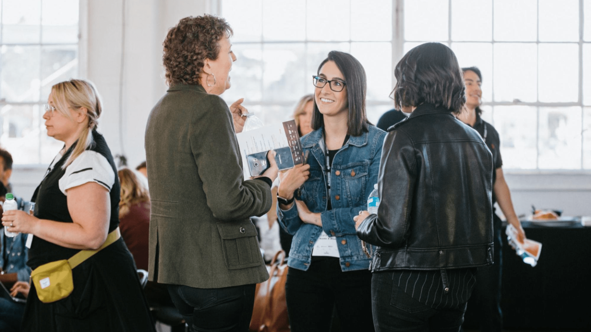 Event guests chat after an event lecture