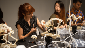 Two people at cat skeleton workshop