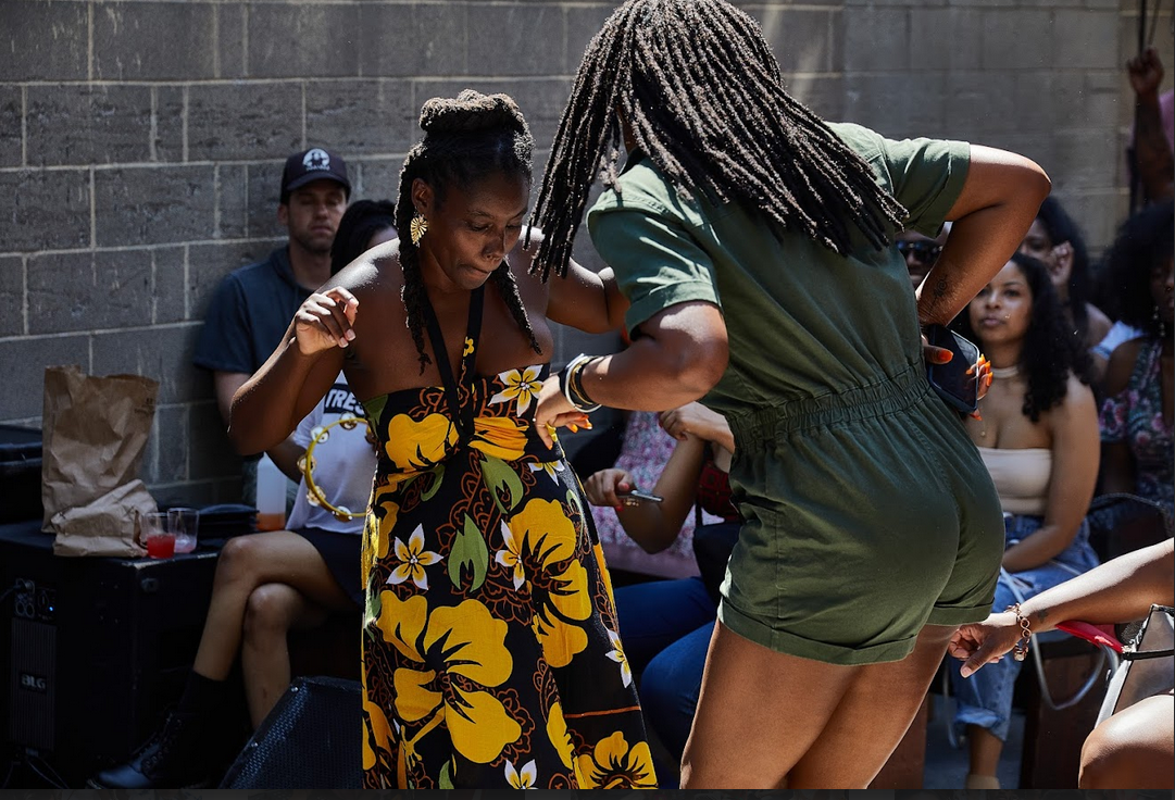 people dancing at a Juneteenth event