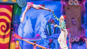 Acrobatic performers do a trick at a Christmas show